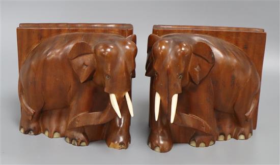 A pair of elephant book ends height 15cm